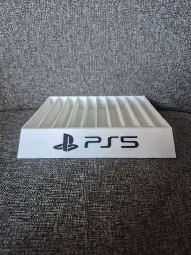 Playstation games stand - games,